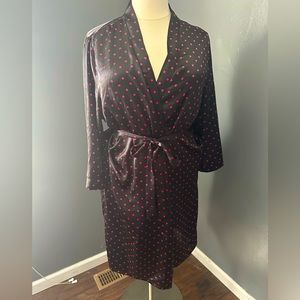 Black robe with pink polka dots